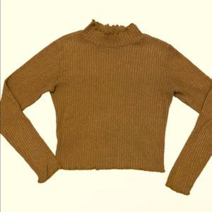 Yellowish orange long sleeved crop top